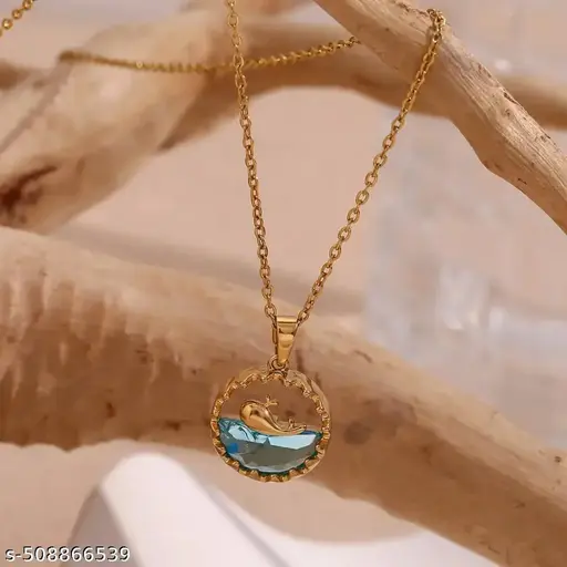 "Woman wearing layered necklaces featuring multiple pendants"