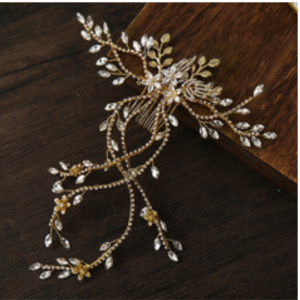 "Intricately braided hair with gold cuffs and beads"