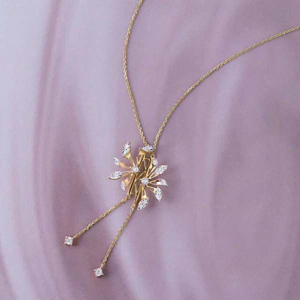 "Model showcasing layered necklaces in mixed metals and styles"