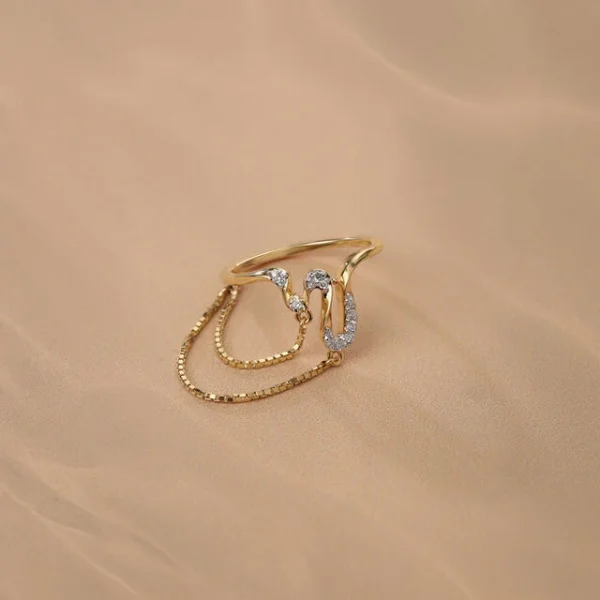 "Silver band ring with engraved floral pattern"