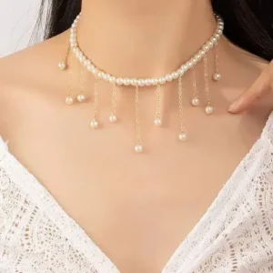 "Pearl necklace with round white pearls and silver clasp"