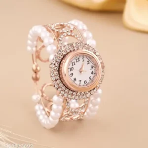 Rose gold mesh bracelet watch with minimalist white dial"